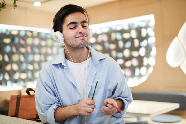 youg man enjoying music